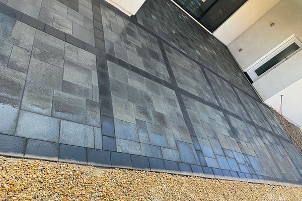 Modern charcoal paver patio